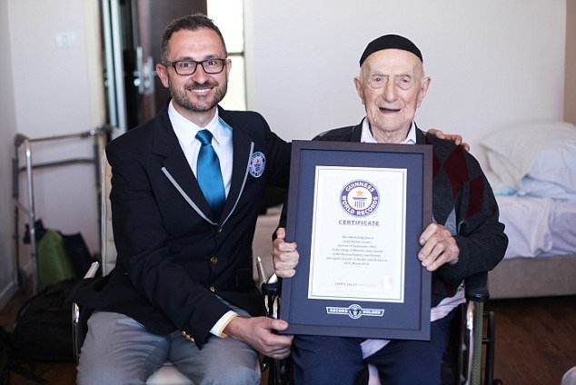 NEW WORLD'S OLDEST MAN ANNOUNCED BY GUINNESS WORLD RECORDS
Marco Frigatti, Head of Records for Guinness World Records, presents Israel Kristal his certificate of achievement for Oldest living man on 11th March 2016, Haifa, Israel. 

Picture credit: Dvir Rosen/Guinness World Records