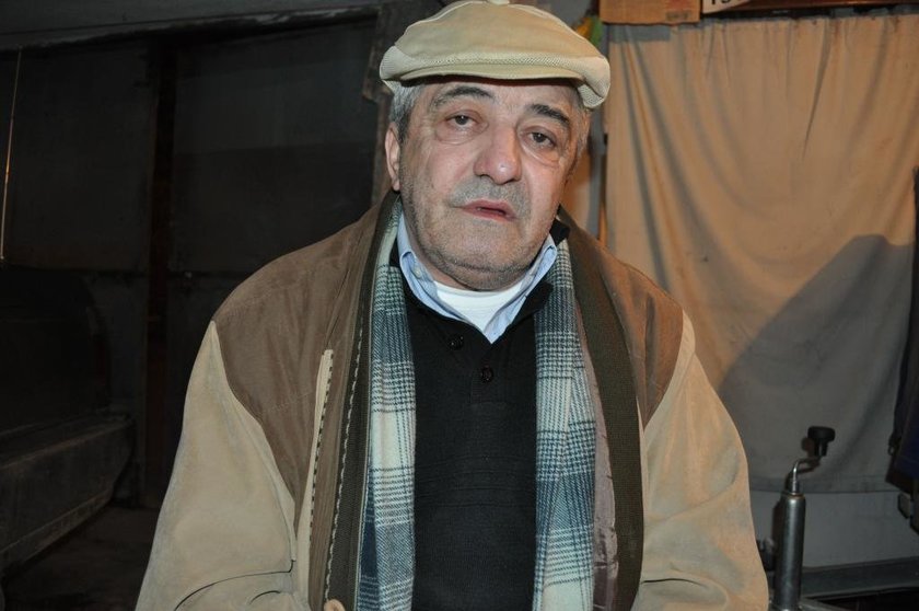Constantin Reliu, 63 is pictured at his place in the eastern town of Barlad, on March 16, 2018. A court rejected Reliu's request for the annulment of a death certificate which was issued in his name in 2016, according to a judgement seen on the court's website on March 16, 2018. The reason for the court's decision has not been confirmed, but according to Romanian media it was due to the deadline for changes to the certificate having passed.  / AFP PHOTO / Adrian ARNAUTU