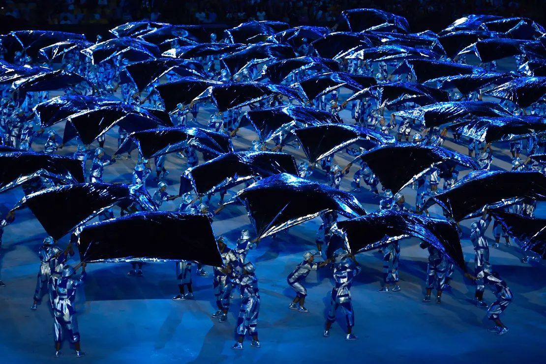 Dancers perform during the opening ceremony of the Rio 2016 Olympic Games at the Maracana stadium in Rio de Janeiro on August 5, 2016. / AFP PHOTO / Fabrice COFFRINI
