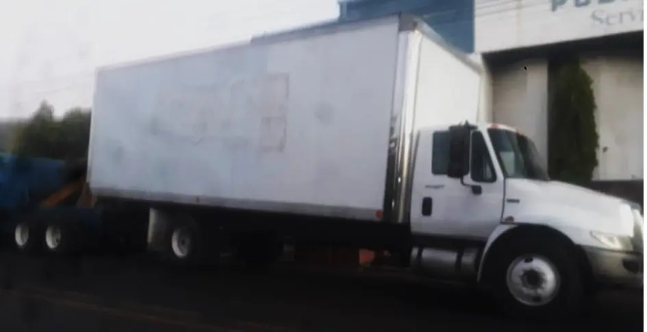 Cami&oacute;n con cigarro