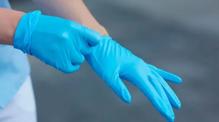 Guantes de L&aacute;tex