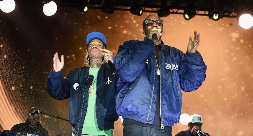 NEW YORK, NY - MAY 03:  Wiz Khalifa and Snoop Dog perform onstage at the AOL NewFront 2016 at Seaport District NYC on May 3, 2016 in New York City.  (Photo by Jamie McCarthy/Getty Images for AOL)