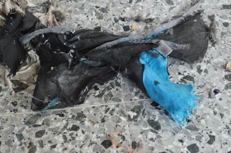 This photo obtained May 24, 2017 courtesy of The New York Times (http://nyti.ms/2rV9VcF) from British Law Enforcement, shows what the bomber in the Manchester terrorist attack appeared to have carried as a powerful explosive in a lightweight metal container concealed within a blue Karrimor backpack, and to have held a small detonator in his left hand, according to preliminary information gathered by British authorities in Manchester, England.
Twenty-two people were killed in Monday's suicide attack on a Manchester pop concert, including an eight-year-old girl and several parents who had come to collect their children. / AFP PHOTO / THE NEW YORK TIMES / Handout / RESTRICTED TO EDITORIAL USE - MANDATORY CREDIT "AFP PHOTO / THE NEW YORK TIMES/HANDOUT" - NO MARKETING NO ADVERTISING CAMPAIGNS - DISTRIBUTED AS A SERVICE TO CLIENTS

