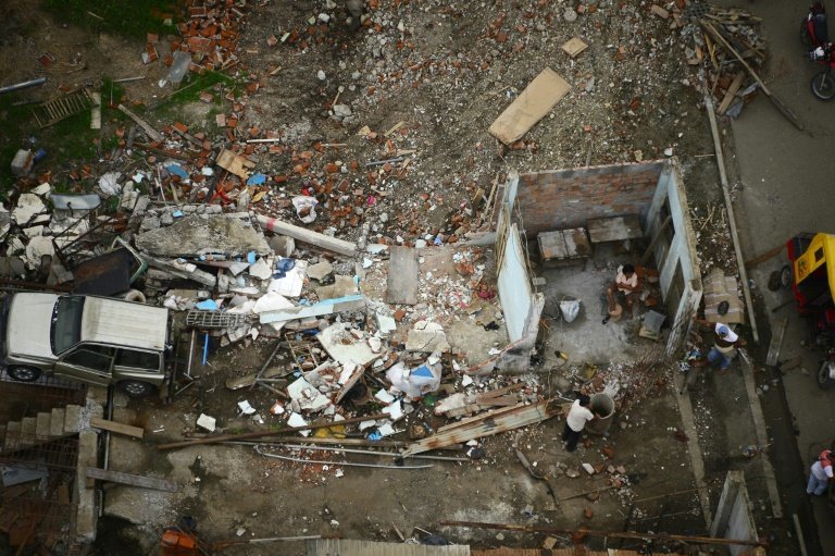 <p>Vista aérea de la localidad ecuatoriana de Pedernales el 16 de mayo de 2016, un mes después del sismo de 7,8 grados de magnitud que asoló la región</p>