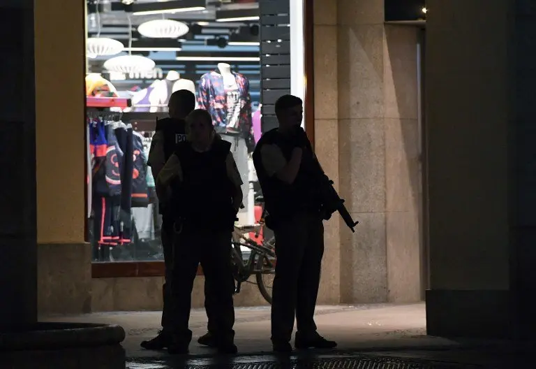 Policemen securing the pedestrian zone in Munich, Germany, 22 July 2016. After a shootout in the Olympia shopping centre (OEZ), the police reported severa injuries and possible deaths. PHOTO: SVEN HOPPE/dpa