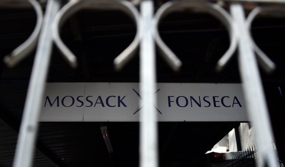 View of a sign outside the building where Panama-based Mossack Fonseca law firm offices are in Panama City, on April 4, 2016. A massive leak -coming from Mossack Fonseca- of 11.5 million tax documents on Sunday exposed the secret offshore dealings of aides to Russian president Vladimir Putin, world leaders and celebrities including Barcelona forward Lionel Messi. An investigation into the documents by more than 100 media groups, described as one of the largest such probes in history, revealed the hidden offshore dealings in the assets of around 140 political figures -- including 12 current or former heads of states. AFP PHOTO/ Rodrigo ARANGUA