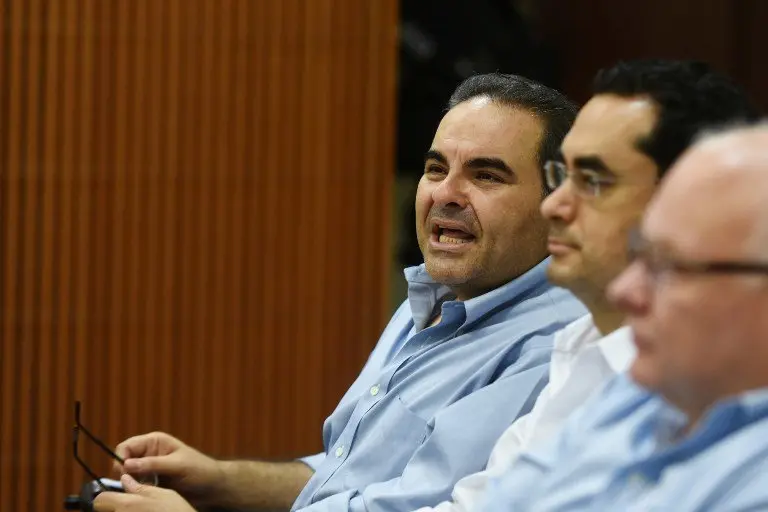 Former Salvadoran President (2004-2009), Elias Antonio Saca, attends a hearing at the Isidro Menendez Judicial Centre in San Salvador, on November 4, 2016.
Saca, arrested alongside six other people over the past weekend, was accused by the Salvadorean public prosecutor's office of diverting $246 million dollars from state coffers. / AFP PHOTO / Marvin RECINOS