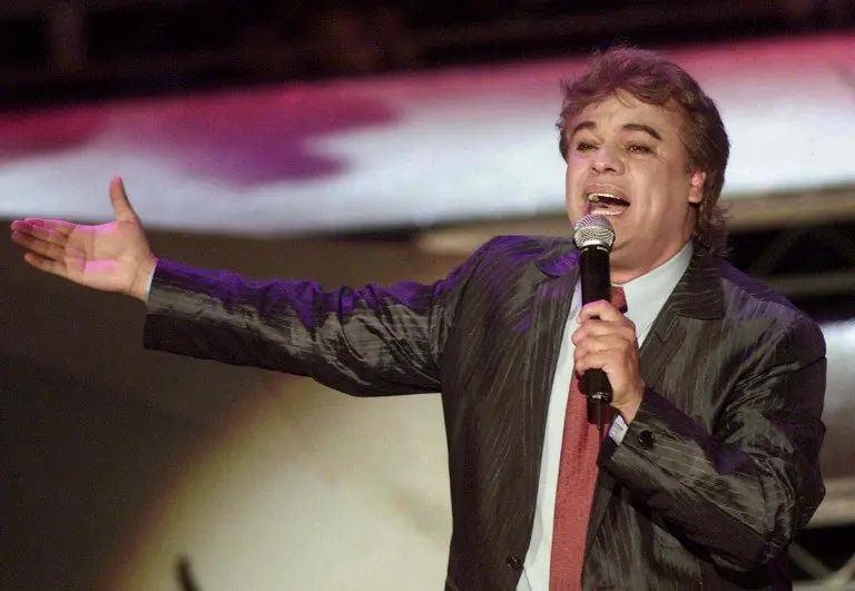 (FILES) This file photo taken on October 17, 2001 shows Mexican singer Juan Gabriel performing at the 3rd Annual Ritmo Latino Music Awards at the Shrine Auditorium in Los Angeles.
Juan Gabriel competes posthumously in the 2016 Latin Grammy Awards for Best Album of the Year and Best Traditional Pop Vocal Album for a production that included recordings with several stars of the continent. / AFP PHOTO / LUCY NICHOLSON
