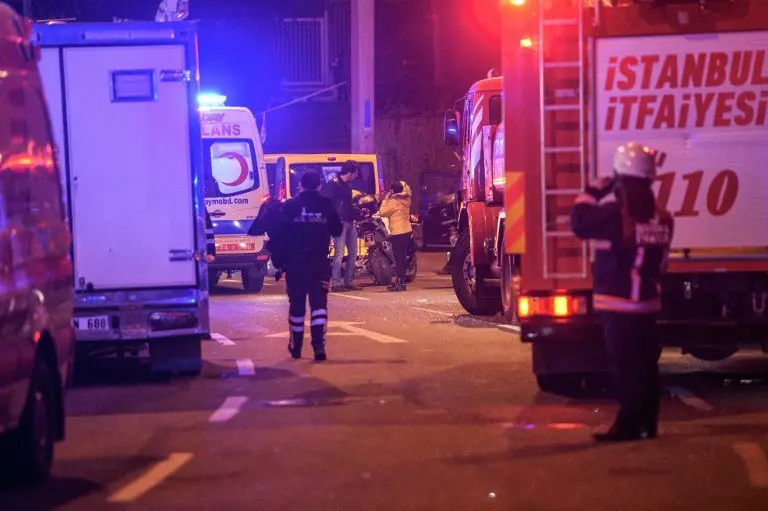 Turkish emercency workers are seen on the site where a car bomb exploded near the stadium of football club Besiktas in central Istanbul on December 10, 2016.
The car bomb exploded in the heart of Istanbul on late December 10, wounding around 20 police officers, Turkey's interior minister said, quoted by the official Anadolu news agency. The bomb, apparently targeting a bus carrying police officers, exploded outside the stadium of Istanbul football club Besiktas following its match against Bursaspor. / AFP PHOTO / OZAN KOSE