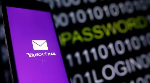 Yahoo Mail logo is displayed on a smartphone's screen in front of code in this illustration picture, October 6, 2016. REUTERS/Dado Ruvic/Illustration/File Photo