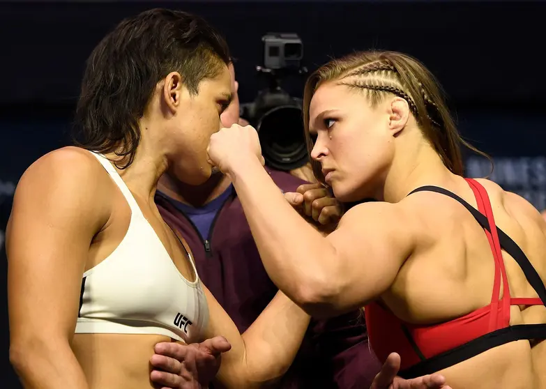 LAS VEGAS, NV - DECEMBER 29: (L-R) UFC women's bantamweight champion Amanda Nunes of Brazil and Ronda Rousey face off during the UFC 207 weigh-in at T-Mobile Arena on December 29, 2016 in Las Vegas, Nevada. (Photo by Josh Hedges/Zuffa LLC/Zuffa LLC via Getty Images)