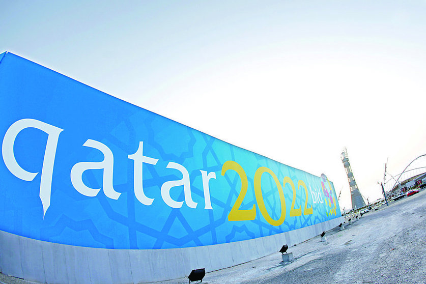 TO GO WITH AFP STORY BY FRANCOISE CHAPTAL

(FILES)  -- File picture dated March 22, 2010 shows a banner for Qatar's 2022 bid to host the World Cup is seen near Aspire athletics zone in Doha. The gulf emirate, future host of the 2022 FIFA World Cup and past playground of several Arab and Asian games, is reaching for the moon as it eyes the 2020 Olympics despite seemingly insurmountable climate challenges.     AFP PHOTO/KARIM JAAFAR

