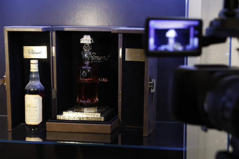 This picture taken on February 21, 2017, shows the world's most expensive rhum bottle sold in auction to raise money for an association fighting sick cells anemia, in Paris on February 21, 2017. / AFP PHOTO / PATRICK KOVARIK