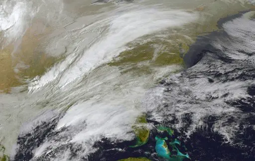 This NOAA/NASA GOES East satellite handout image taken on March 13, 2017 at 1400 UTC shows storm activity in the eastern United States.
Nearly half the United States was caught in an icy blast on March 13, 2017, with much of the East Coast bracing for what could be the worst winter storm of the year. Spring may be around the corner after an unusually warm winter throughout much of the region, but a powerful nor'easter called Winter Storm Stella is forming near the coast as two low pressure systems collide, burying a wide area from the central Appalachians to New England under up to 18 inches (46 centimeters) of snow. The National Weather Service cautioned that the storm could bring record-low temperatures late Monday into Tuesday, as well as "blizzard conditions in places, difficult travel and power outages."
/ AFP PHOTO / NOAA-NASA GOES Project / Handout / RESTRICTED TO EDITORIAL USE - MANDATORY CREDIT AFP PHOTO /NOAA-NASA GOES Project - NO MARKETING - NO ADVERTISING CAMPAIGNS - DISTRIBUTED AS A SERVICE TO CLIENTS