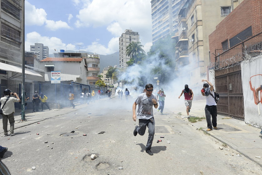 Disturbios durante una manifestación de la oposición en Caracas, Venezuela.