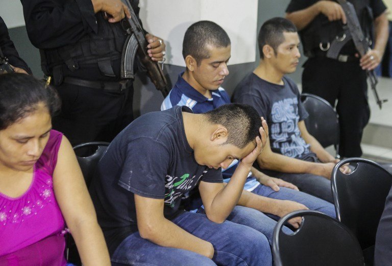 Evangelical pastor Juan Rocha (C-dark t-shirt) gestures upon hearing his sentence to 30 years of imprisonment for the abduction and murder of Vilma Trujillo, in Managua on May 9, 2017.
A pastor who carried out an exorcism in remote Nicaragua that resulted in the death of a 25-year-old mother of two was found guilty of murder on Tuesday. A Managua jury announced the conviction of Evangelical pastor Juan Rocha and four followers over the deadly rite, carried out February 15 to 21 in the isolated village of El Cortezal in northeastern Nicaragua. Rocha and three of the others were also found guilty of illegal detention. / AFP PHOTO / INTI OCON