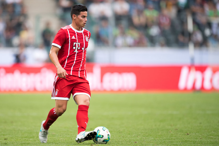 Bayern Munich's new Colombian midfielder James Rodriguez controls the ball during the Telekom Cup football final match between Bayern Munich and Werder Bremen in Moenchengladbach, western Germany on July 15, 2017. / AFP PHOTO / dpa / Marius Becker / Germany OUT