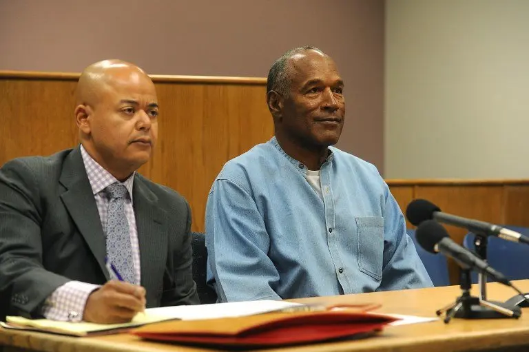 O.J. Simpson looks on during a parole hearing at the Lovelock Correctional Center in Lovelock, Nevada on July 20, 2017.
Former American football star O.J. Simpson has spent nearly nine years in prison. A Nevada parole board is holding the hearing to decide whether the former National Football League (NFL) star and actor should be released from prison. / AFP PHOTO / POOL / Jason Bean / RESTRICTED TO EDITORIAL USE - MANDATORY CREDIT "AFP PHOTO /POOL/ Jason Bean" - NO MARKETING NO ADVERTISING CAMPAIGNS - DISTRIBUTED AS A SERVICE TO CLIENTS