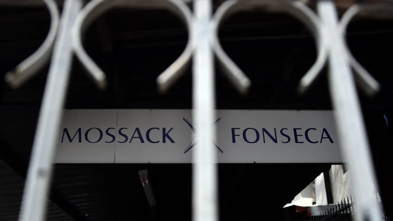 View of a sign outside the building where Panama-based Mossack Fonseca law firm offices are in Panama City, on April 4, 2016. A massive leak -coming from Mossack Fonseca- of 11.5 million tax documents on Sunday exposed the secret offshore dealings of aides to Russian president Vladimir Putin, world leaders and celebrities including Barcelona forward Lionel Messi. An investigation into the documents by more than 100 media groups, described as one of the largest such probes in history, revealed the hidden offshore dealings in the assets of around 140 political figures -- including 12 current or former heads of states. AFP PHOTO/ Rodrigo ARANGUA