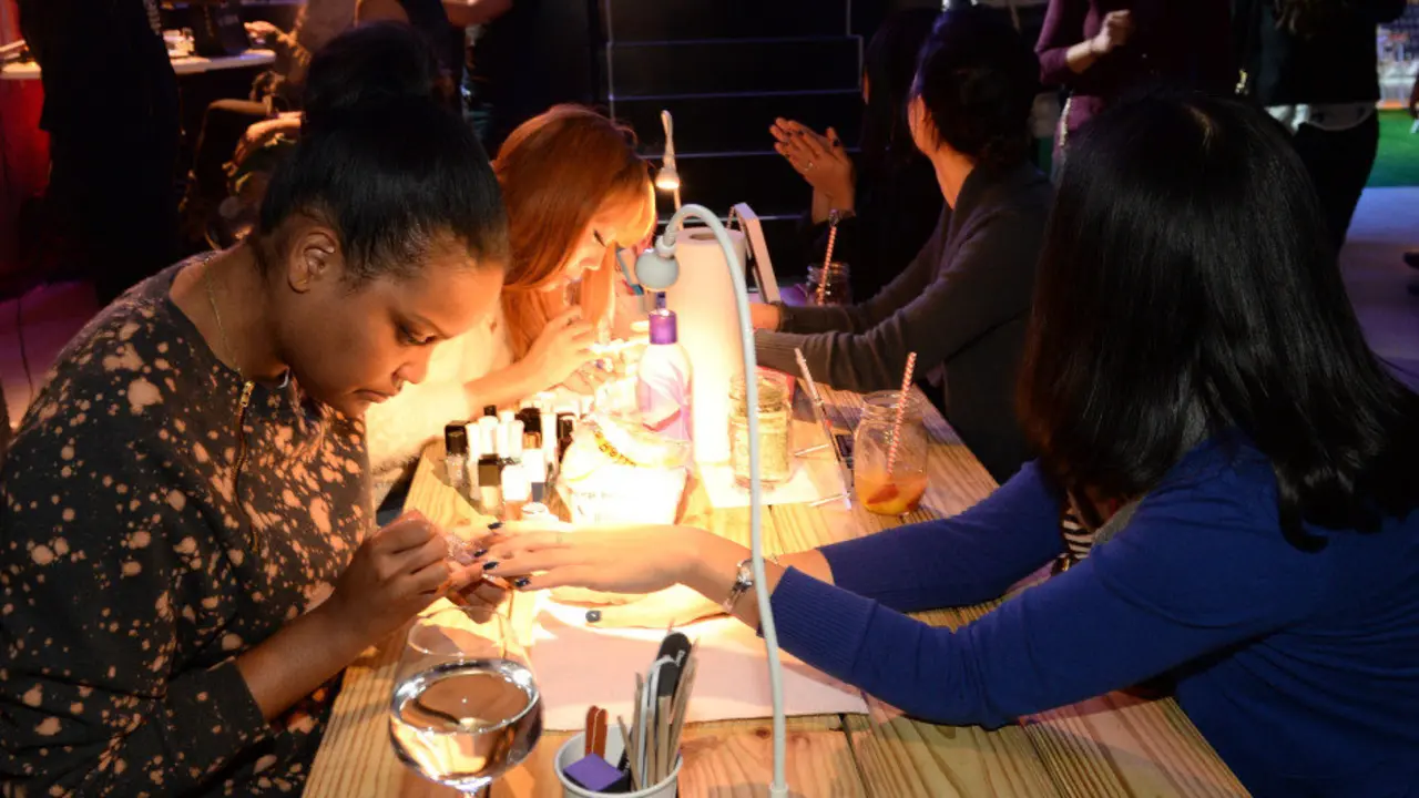 NEW YORK, NY - JANUARY 29:  Guests enjoy Smirnoff Ice and a Nail Salon at the Ladies With Game Tailgate at The Diageo Liquid Cellar on January 29, 2014 in New York City.  (Photo by Rick Diamond/Getty Images for Smirnoff Ice)