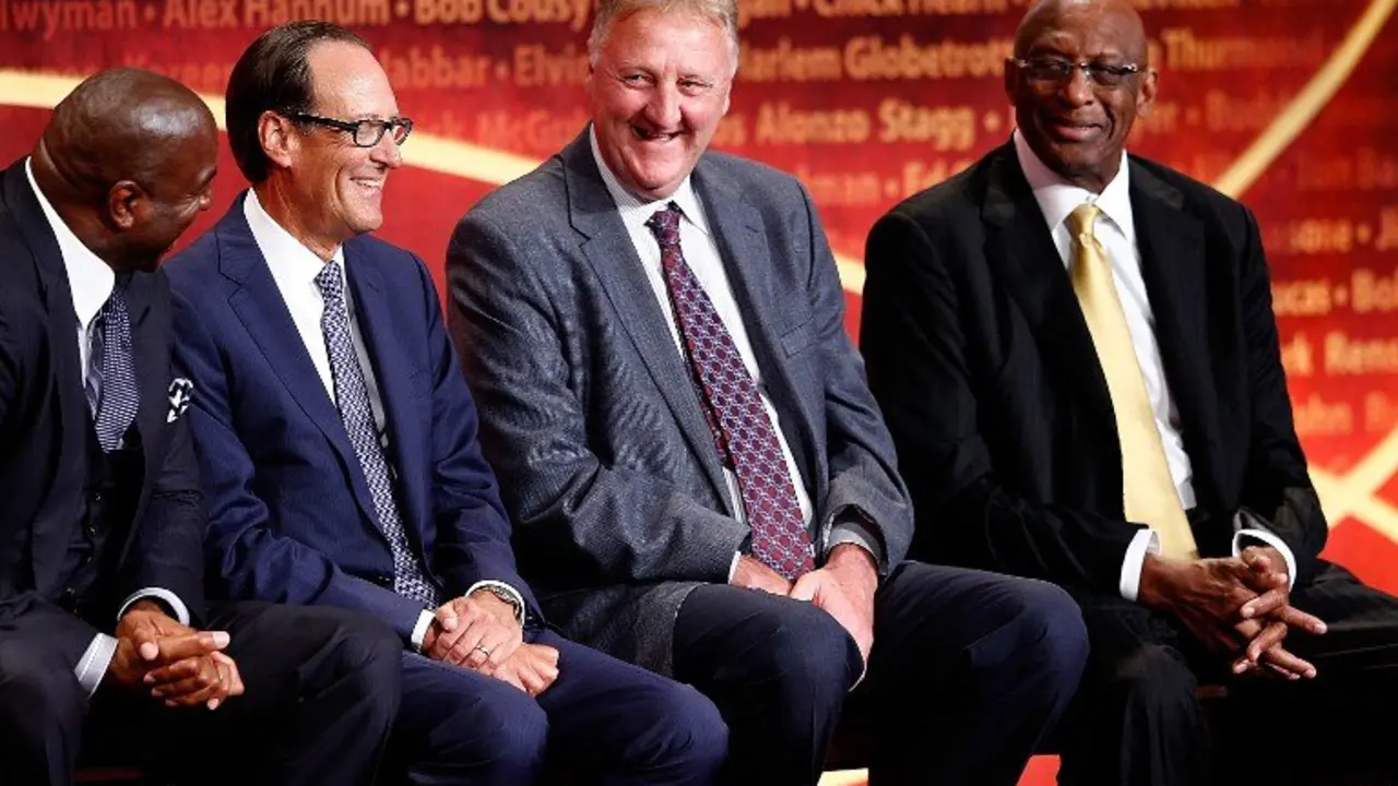 SPRINGFIELD, MA - AUGUST 8: David Stern, inductee, speaks while presenters Bill Russell, Larry Bird, Earvin 'Magic' Johnson, Bob Lanier, and NBA contributor Russ Granik listen during the 2014 Basketball Hall of Fame Enshrinement Ceremony at Symphony Hall on August 8, 2014 in Springfield, Massachusetts.   Jim Rogash/Getty Images/AFP