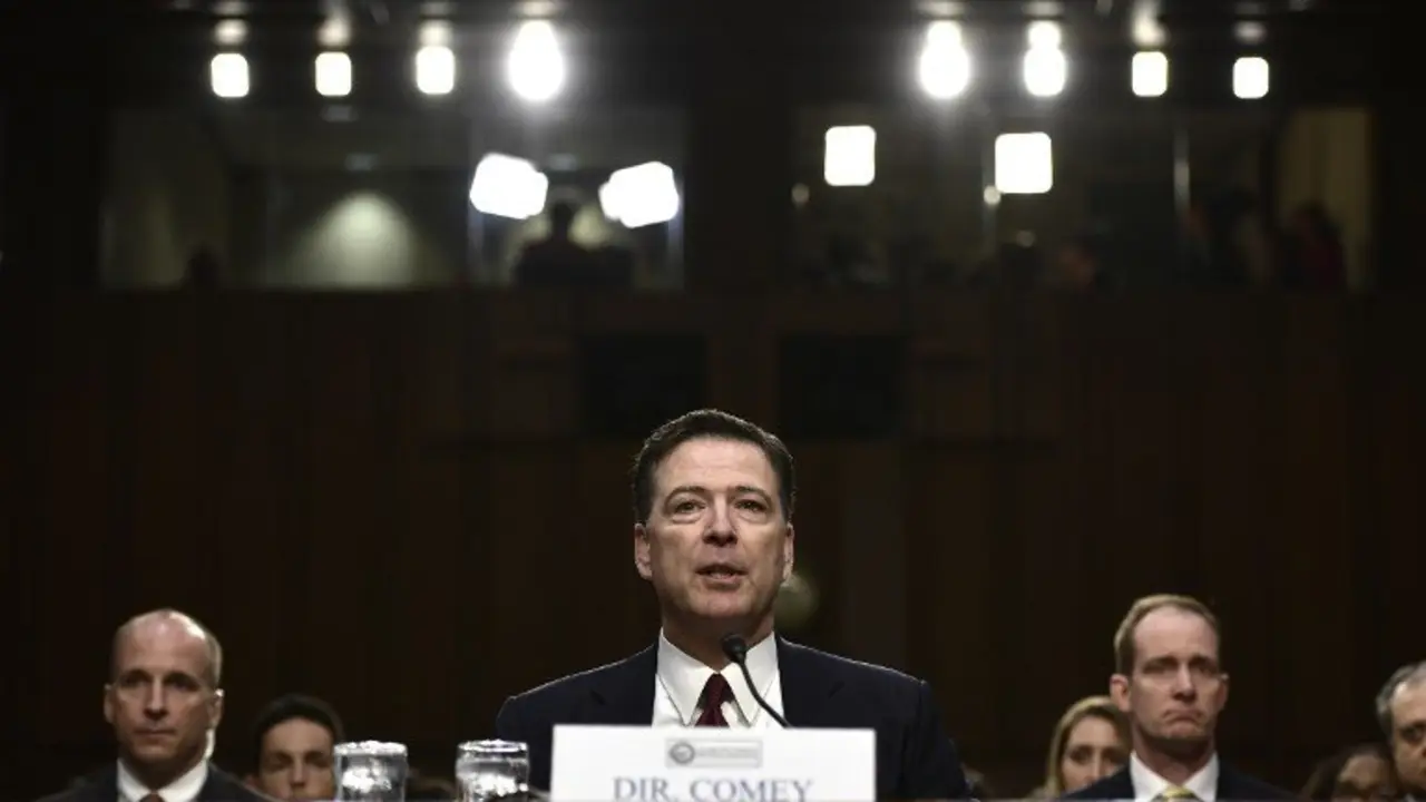 Former FBI Director James Comey testifies during a US Senate Select Committee on Intelligence hearing on Capitol Hill in Washington, DC, June 8, 2017.
Fired FBI director James Comey took the stand Thursday in a crucial Senate hearing, repeating explosive allegations that President Donald Trump badgered him over the highly sensitive investigation Russia's meddling in the 2016 election. / AFP PHOTO / Brendan Smialowski