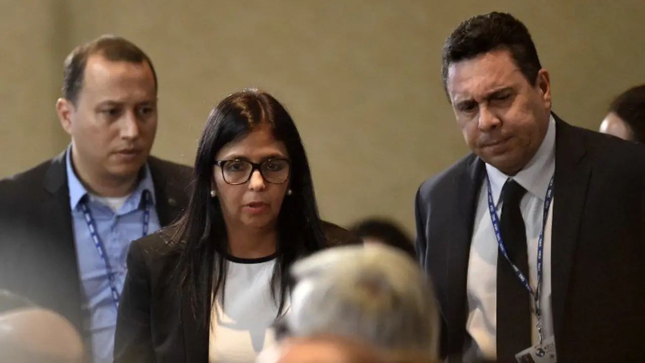Venezuelan Foreign Minister Delcy Rodriguez leaves a meeting with foreign ministers ahead of the OAS 47th General Assembly in Cancun, Mexico, on June 19, 2017. / AFP PHOTO / Pedro Pardo