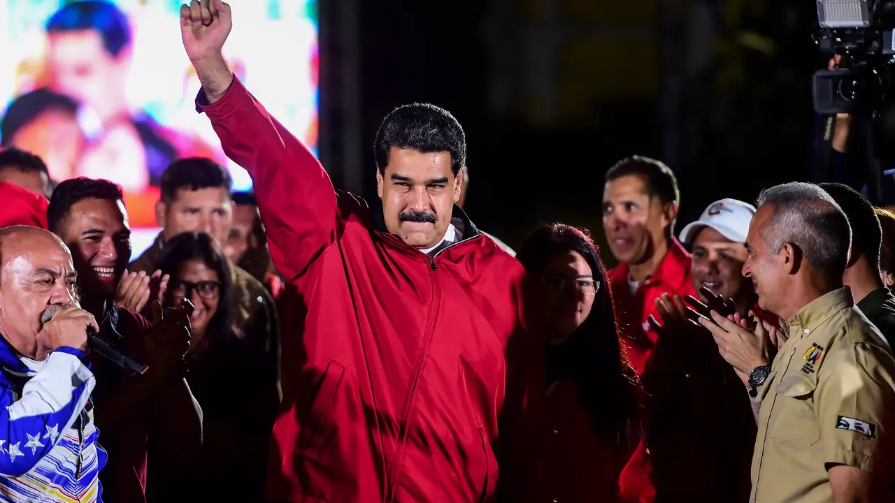 Venezuelan president Nicolas Maduro celebrates the results of "Constituent Assembly", in Caracas, on July 31, 2017.
Deadly violence erupted around the controversial vote, with a candidate to the all-powerful body being elected shot dead and troops firing weapons to clear protesters in Caracas and elsewhere.  / AFP PHOTO / RONALDO SCHEMIDT