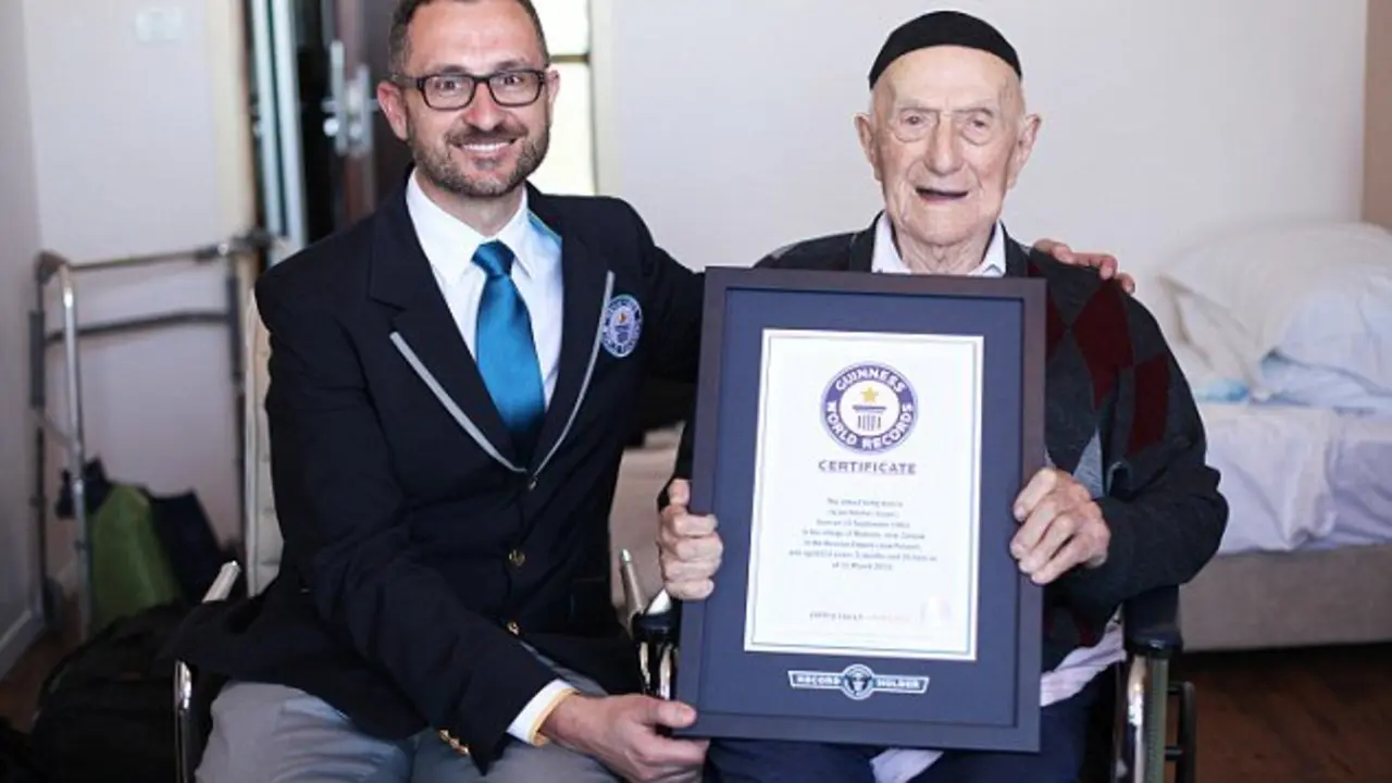 NEW WORLD'S OLDEST MAN ANNOUNCED BY GUINNESS WORLD RECORDS
Marco Frigatti, Head of Records for Guinness World Records, presents Israel Kristal his certificate of achievement for Oldest living man on 11th March 2016, Haifa, Israel. 

Picture credit: Dvir Rosen/Guinness World Records