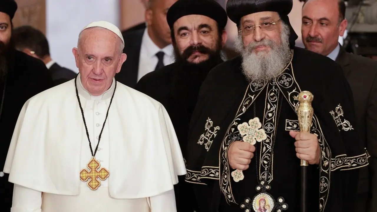 Pope Francis, left, is flanked by Pope Tawadros II, spiritual leader of Egypt's Orthodox Christians, 2nd from right, at Cairo's St. Mark's Cathedral, Friday, April 28, 2017. Francis is in Egypt for a two-day trip aimed at presenting a united Christian-Muslim front that repudiates violence committed in God's name. (AP Photo/Gregorio Borgia)