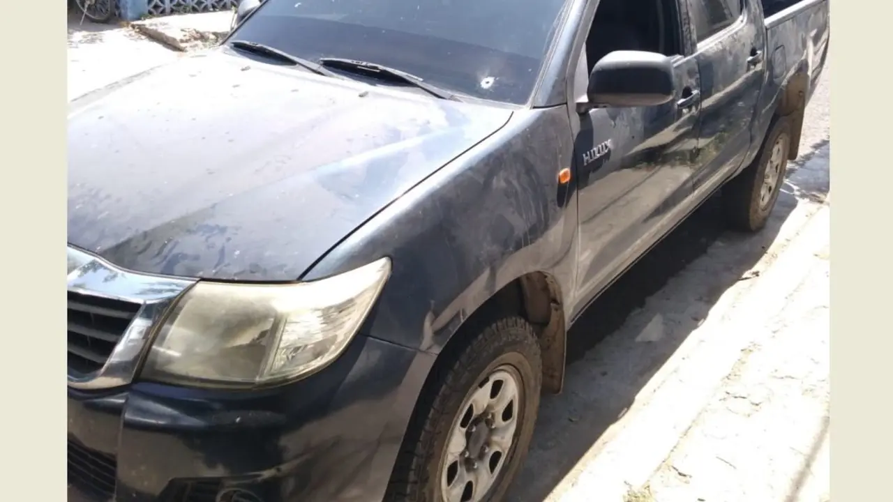 Veh&iacute;culo tiroteado