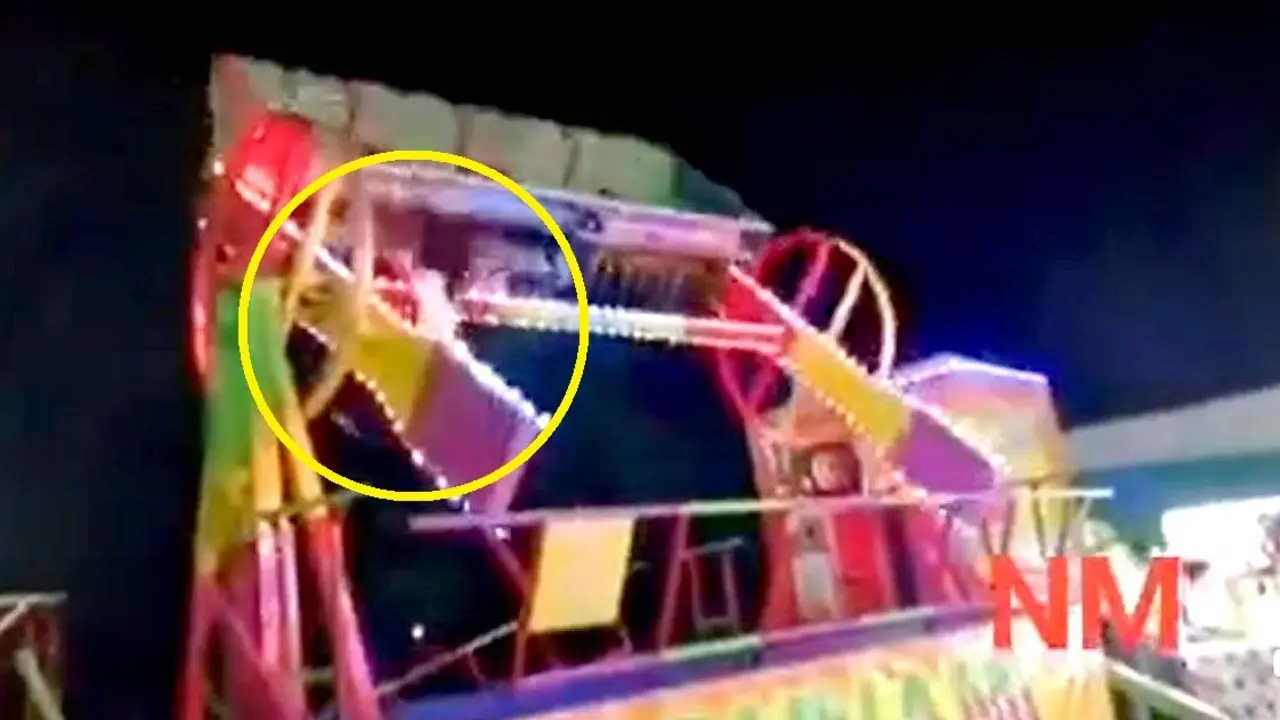 Ni&ntilde;a cae de juego mec&aacute;nico 3