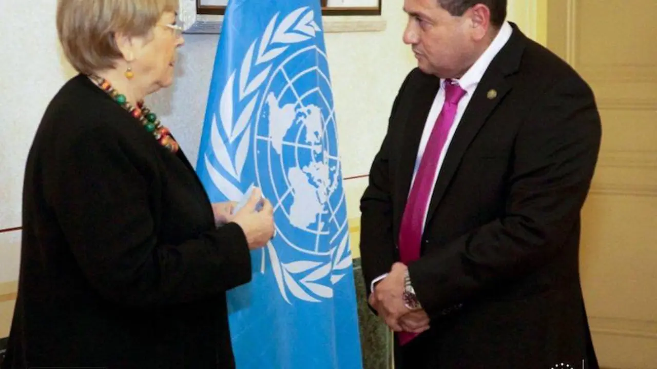 Rolando Castro y Michelle Bachelet