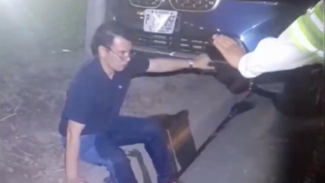 Conductor BMW orinado ebrio en calle a Quezaltepeque