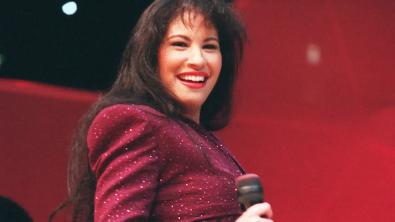 Tejano singer Selena performs at the Astrodome during the Houston Livestock Show and Rodeo on Feb. 26, 1995. (AP Photo/Houston Chronicle, John Everett)