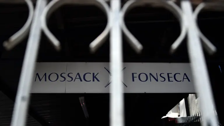 View of a sign outside the building where Panama-based Mossack Fonseca law firm offices are in Panama City, on April 4, 2016. A massive leak -coming from Mossack Fonseca- of 11.5 million tax documents on Sunday exposed the secret offshore dealings of aides to Russian president Vladimir Putin, world leaders and celebrities including Barcelona forward Lionel Messi. An investigation into the documents by more than 100 media groups, described as one of the largest such probes in history, revealed the hidden offshore dealings in the assets of around 140 political figures -- including 12 current or former heads of states. AFP PHOTO/ Rodrigo ARANGUA