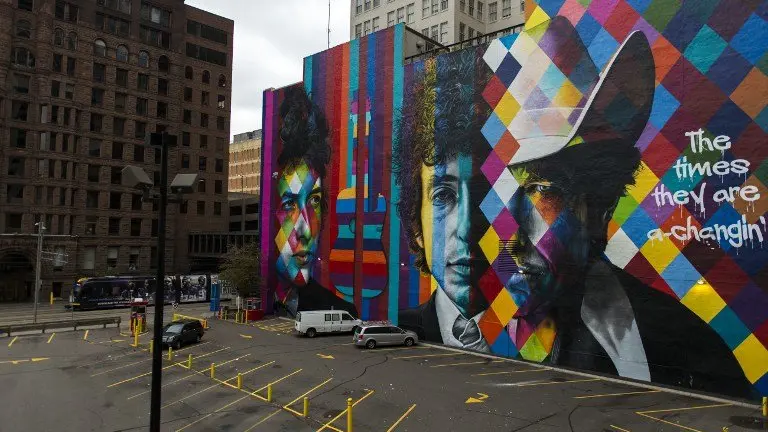 A mural of songwriter Bob Dylan by Brazilian artist Eduardo Kobra is on display in downtown Minneapolis, Minnesota on October 15, 2016. On October 13, 2016, Dylan was awarded the Nobel Prize in Literature.
Dylan is the second Nobel laureate in literature from Minnesota after Sinclair Lewis, whose biting satire of Midwestern life and the race to materialism won him the prize in 1930, a first by an American. Dylan's Nobel comes months after Minnesota's other musical luminary -- Prince, who proudly associated himself with the Minneapolis area -- died of an accidental painkiller overdose.
 / AFP PHOTO / STEPHEN MATUREN / TO GO WITH AFP STORY by Shaun TANDON, "For Dylan, aura of mystery extends to hometown"
RESTRICTED TO EDITORIAL USE - MANDATORY MENTION OF THE ARTIST UPON PUBLICATION - TO ILLUSTRATE THE EVENT AS SPECIFIED IN THE CAPTION