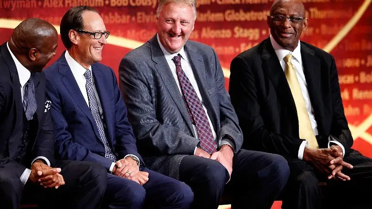 SPRINGFIELD, MA - AUGUST 8: David Stern, inductee, speaks while presenters Bill Russell, Larry Bird, Earvin 'Magic' Johnson, Bob Lanier, and NBA contributor Russ Granik listen during the 2014 Basketball Hall of Fame Enshrinement Ceremony at Symphony Hall on August 8, 2014 in Springfield, Massachusetts.   Jim Rogash/Getty Images/AFP