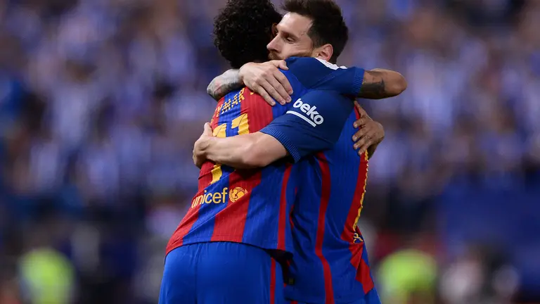Barcelona's Brazilian forward Neymar (L) celebrates with Barcelona's Argentinian forward Lionel Messi after scoring during the Spanish Copa del Rey (King's Cup) final football match FC Barcelona vs Deportivo Alaves at the Vicente Calderon stadium in Madrid on May 27, 2017. / AFP PHOTO / Josep LAGO