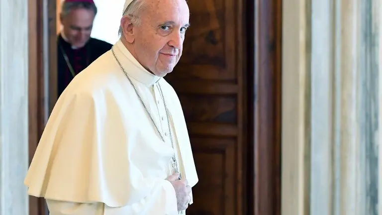 Pope Francis looks on at the end of a private audience with German chancellor at the Vatican on June 17, 2017.  / AFP PHOTO / POOL / Ettore FERRARI