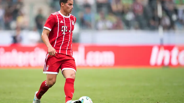 Bayern Munich's new Colombian midfielder James Rodriguez controls the ball during the Telekom Cup football final match between Bayern Munich and Werder Bremen in Moenchengladbach, western Germany on July 15, 2017. / AFP PHOTO / dpa / Marius Becker / Germany OUT