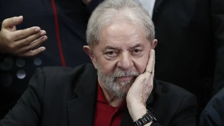 Former Brazilian president Luiz Inacio Lula Da Silva gestures during a press conference in Sao Paulo, Brazil on July 13, 2017.
Brazil's former president Luiz Inacio Lula da Silva said on Thursday -- a day after he was convicted and sentenced for graft -- that judges and political opponents were "destroying democracy." In his first public reaction to the verdict handed down on Wednesday, Lula implied the judgment was aimed at preventing him being a comeback candidate in presidential elections next year. "They're destroying democracy in our country," he told reporters in Sao Paulo.
 / AFP PHOTO / Miguel SCHINCARIOL
