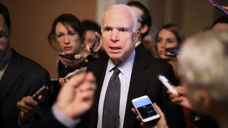 (FILES) This file photo taken on July 13, 2017 shows Sen. John McCain (R-AZ) leaving a meeting where a new version of a GOP healthcare bill was unveiled to Republican senators at the US Capitol in Washington, DC. 
US Senator John McCain has been diagnosed with brain cancer, his office said July 19, 2017.  / AFP PHOTO / GETTY IMAGES NORTH AMERICA / CHIP SOMODEVILLA