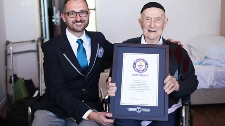 NEW WORLD'S OLDEST MAN ANNOUNCED BY GUINNESS WORLD RECORDS
Marco Frigatti, Head of Records for Guinness World Records, presents Israel Kristal his certificate of achievement for Oldest living man on 11th March 2016, Haifa, Israel. 

Picture credit: Dvir Rosen/Guinness World Records