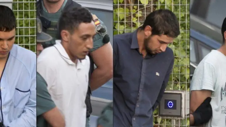 (COMBO) This combination of pictures created on August 22, 2017 shows (from L)
Mohamed Houli Chemlal, Driss Oukabir, Salah El Karib, and Mohamed Aallaa, suspected of involvement in the terror cell that carried out twin attacks in Barcelona and Cambrils, escorded by Spanish Civil Guards from a detention center in Tres Cantos, near Madrid, on August 22, 2017 before being tranferred to the National Court.
Under heavy security, police vans entered the National Court, which deals with terrorism cases, where a judge will question them and decide what -- if any -- charges to press against them over the vehicle attacks that left 15 dead and 120 injured. / AFP PHOTO / STRINGER
