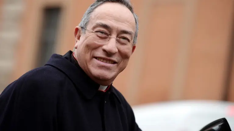 Honduras' cardinal Oscar Andres Rodriguez Maradiaga arrives for an afternoon meeting of pre-conclave on March 8, 2013 at the Vatican. The next pope's ideal profile began to take shape on Tuesday as cardinals held a second day of pre-conclave talks -- a man with pastoral experience, missionary energy and few ties to the Vatican's unruly government.    AFP PHOTO / FILIPPO MONTEFORTE