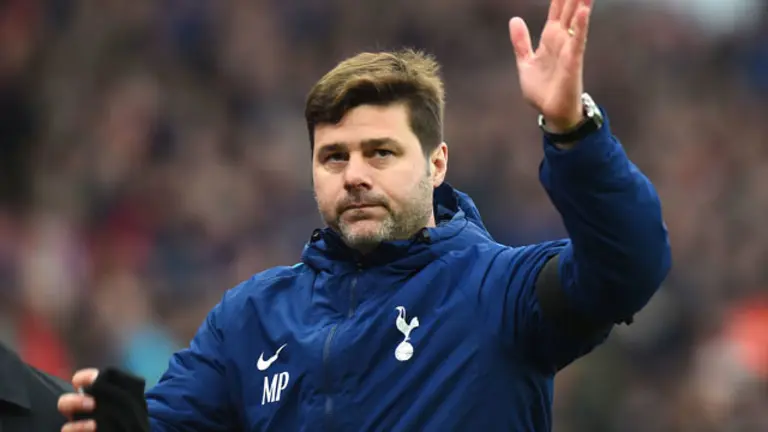 mauricio_pochettino_of_tottenham_hotspur_salutes_the_fans_at_the_749695