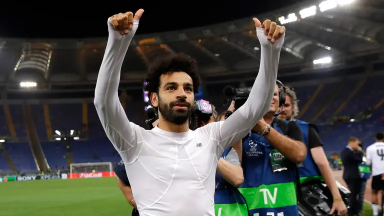Liverpool's Mohamed Salah gestures to the supporters at the end of the Champions League semifinal second leg soccer match between Roma and Liverpool at the Olympic Stadium in Rome, Wednesday, May 2, 2018. (AP Photo/Alessandra Tarantino)