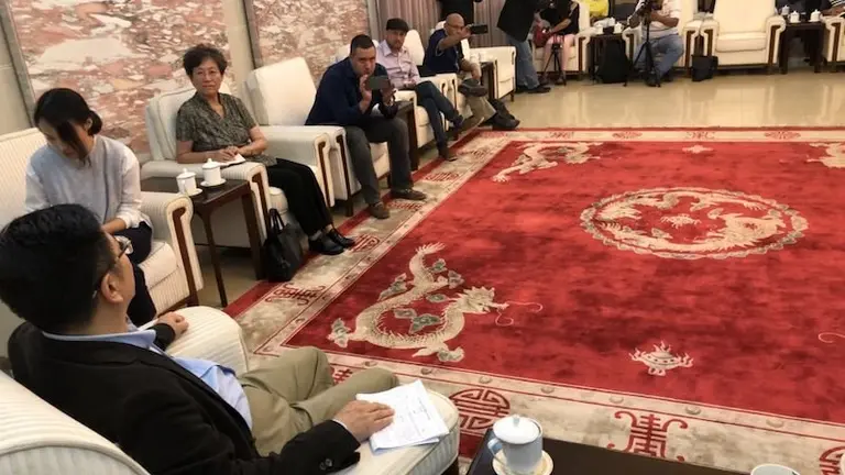 Ma Xiaoguang y delegacion