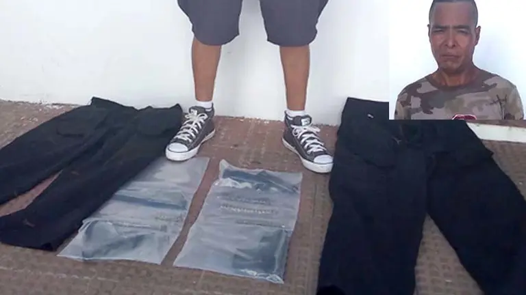 Agente del CAM detenido